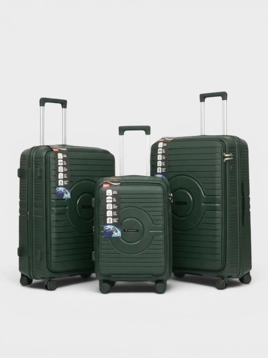 Amara Boutique Store Kuwait 3-piece dark green hardshell luggage set with spinner wheels and TSA locks.