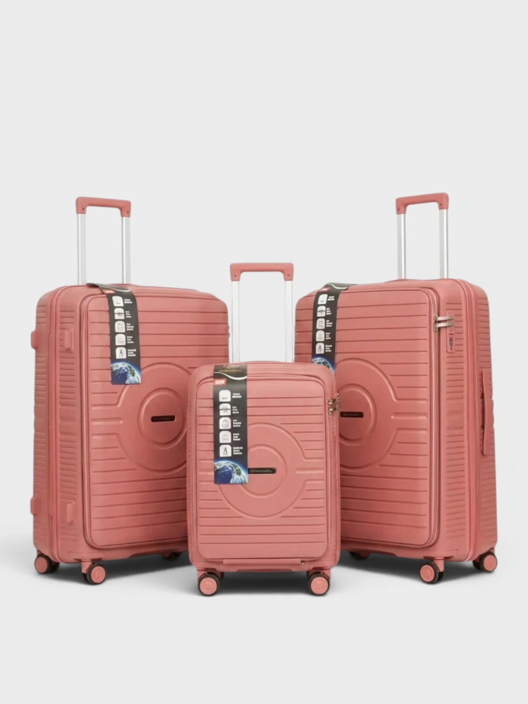 Amara Boutique Store Kuwait three-piece dusty pink hardshell luggage set with spinner wheels and telescopic handles